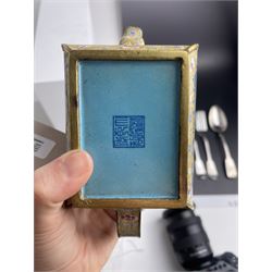 Chinese Qianlong enamel bombé shaped teapot, decorated with scenes of scholars examining a scroll and drinking on a yellow ground with various traditional floral and foliate motifs, the painted scene framed within trailing blue vine border, with Qianlong marks to base L15cm