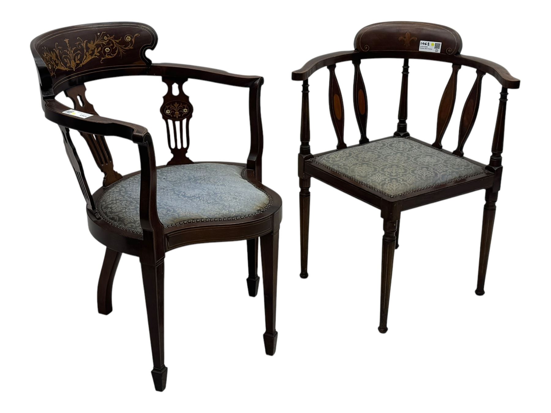 Edwardian inlaid mahogany corner chair, curved arms on shaped splat supports inlaid with satinwood, on turned supports (W60cm, H75cm); Edwardian inlaid mahogany tub-shaped armchair, the cresting rail inlaid with scrolling acanthus leaves and flower heads, on square tapering supports with spade feet (W58cm, H80cm)