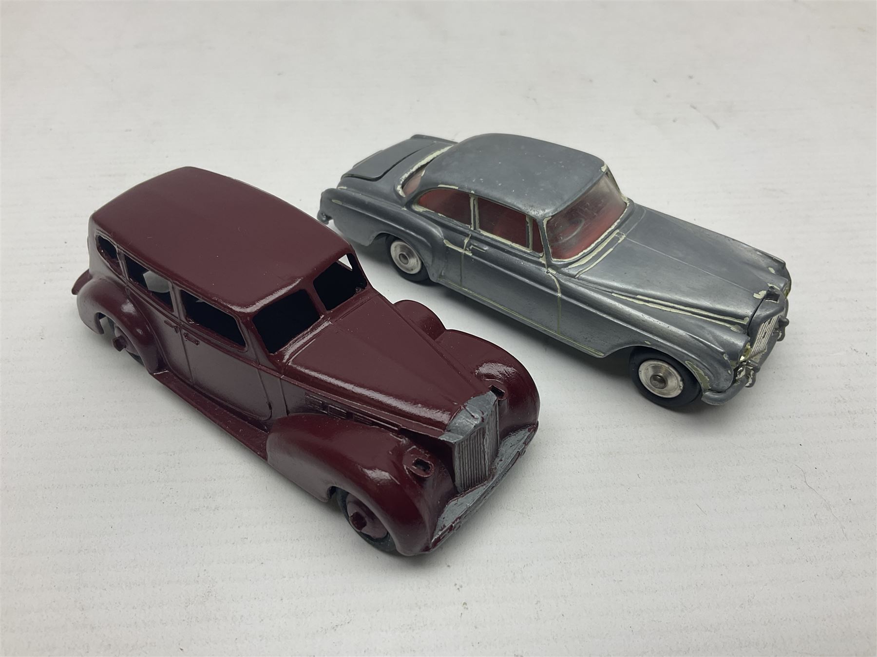 Eleven unboxed and playworn early die-cast models including Dinky Packard, Buick, two Jaguar Mark X and estate wagon, Corgi Mercedes-Benz 300S.L. Roadster, Ford Thunderbird, Citroen DS19 and Bentley Continental Sports Saloon, Spot-On Armstrong Siddeley Sapphire etc; all unboxed (11)