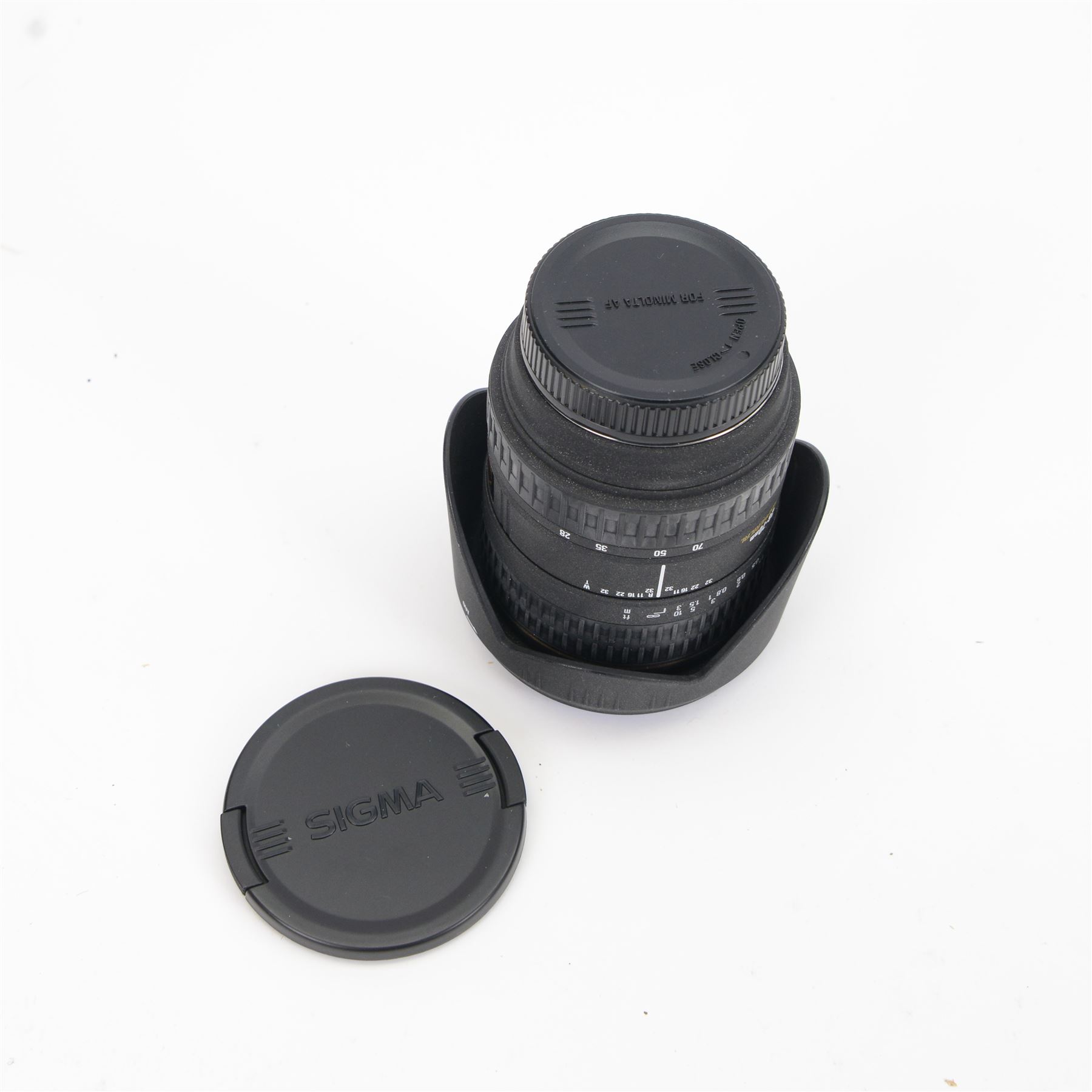 Three Sigma camera lenses, comprising 70-200mm 1:2.8 APO lens serial no. 2001712, Sigma Zoom 28-70mm 1:2.8 aspherical lens serial no. 3005155 and a Sigma Super Wide II 1:2.8 f=24mm lens serial no. 5033919, two with hoods, all in soft shell carry cases