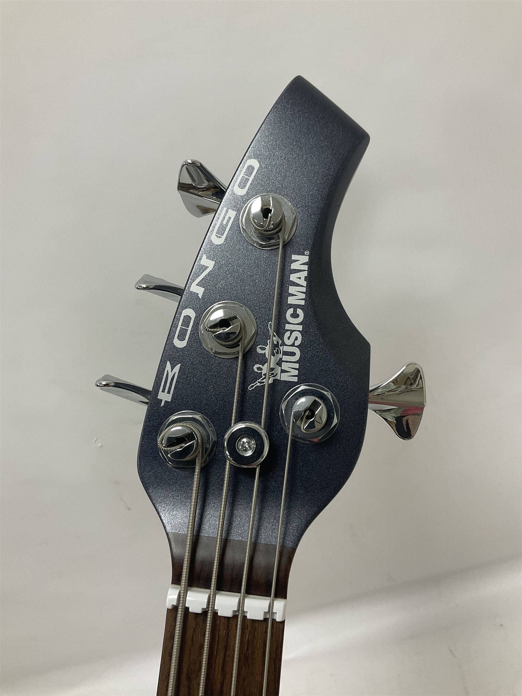 Music Man Bongo 4 string bass guitar, in sapphire black finish, serial no F42547, in black Music Man hard case, guitar L113cm