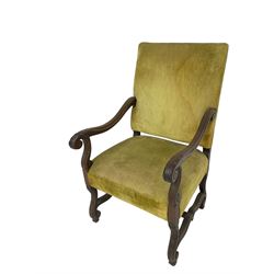 Early 20th century Carolean design mahogany framed throne chair, back and sprung seat upholstered in sage green fabric, scrolled amd reeded arms with carved oak leaf design, shaped supports with scroll feet united by waived stretchers