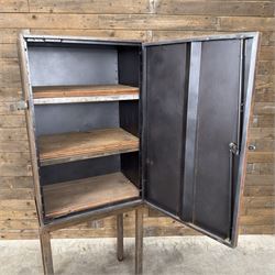 Luxor - industrial modular cabinet, three sections comprising single drawer, double drawer and single cupboard, raised on stand; and a tall industrial cabinet