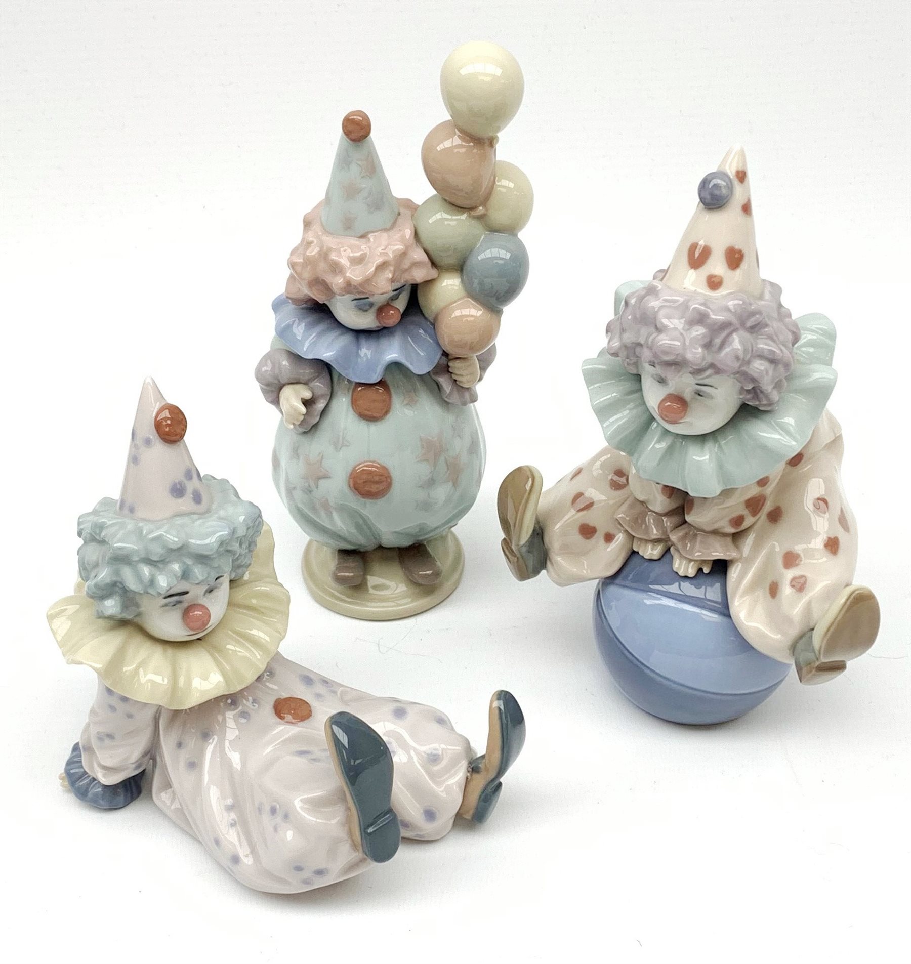 Three Lladro Clown figures Littlest Clown, no.5811, Tired Friend, no