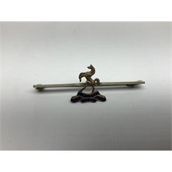 Royal West Kent regiment 9ct gold and enamel sweetheart brooch; The Queens Own regiment silver and enamel sweetheart brooch; and another sweetheart brooch for the Royal West Kent regiment (3)