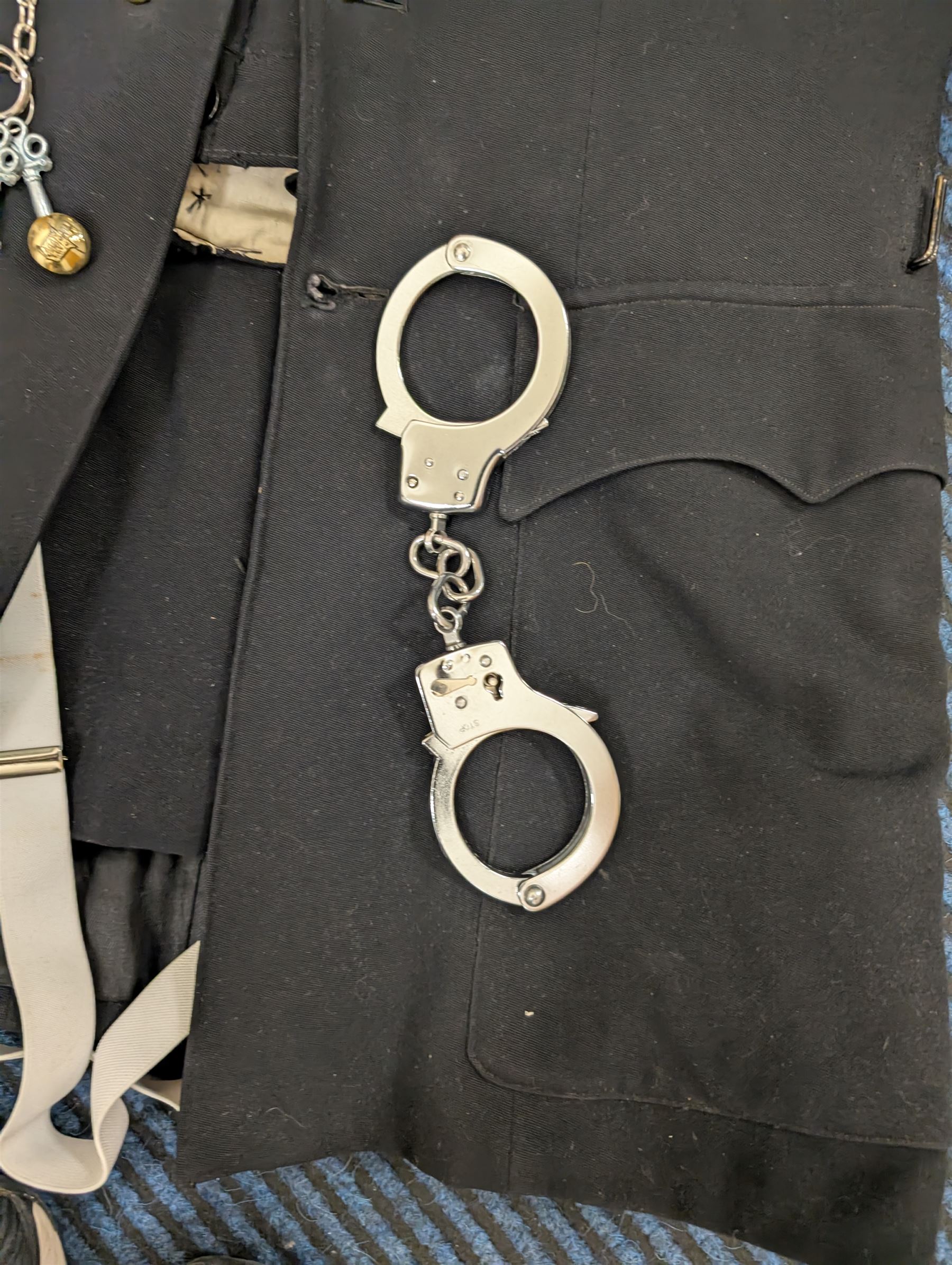 British Police Offices re-enactment uniform, including helmet, handcuffs and jacket