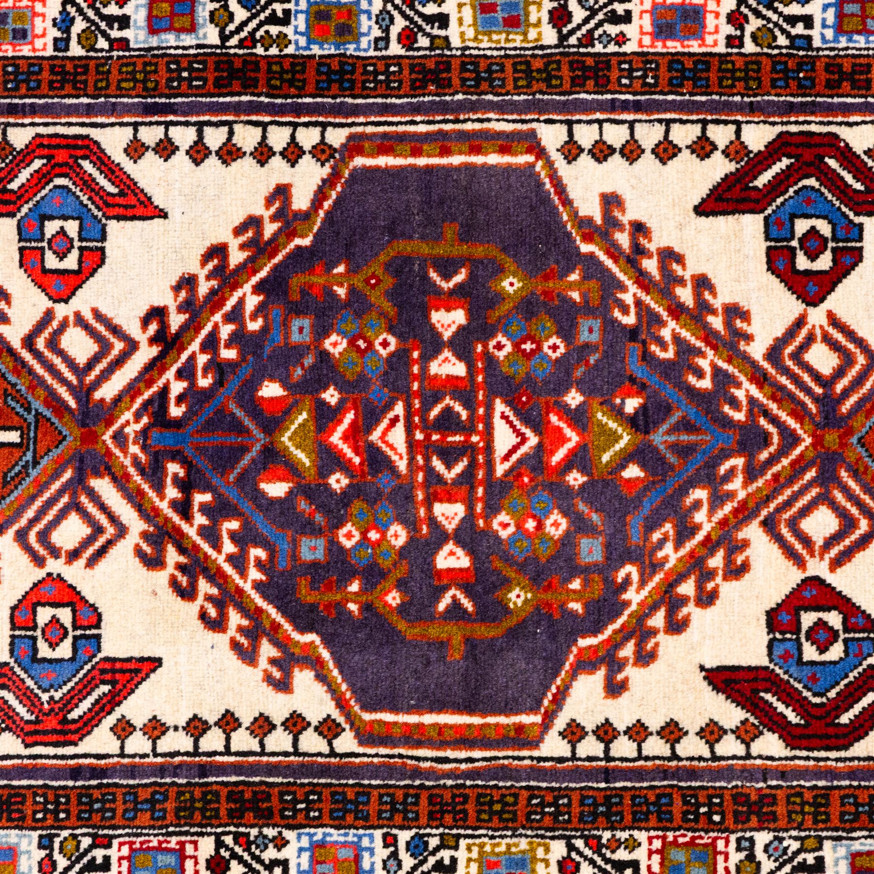 North West Persian Ardebil hand-knotted runner, ivory field decorated with row of large hexagonal medallions enclosing stylized geometric and floral motifs, linked by angular devices, within multiple geometric borders, cotton fringe ends 
