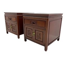A pair of Chinese hardwood lamp cabinets, fitted with single drawer and two cupboards,  carved detail
