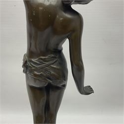 Bronzed semi nude female figure with one hand raised, upon a marble plinth, H43cm  