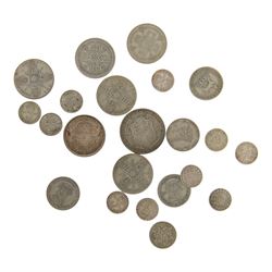 Approximately 107 grams of Great British pre-1947 silver coins, and a King George VI Canada 1943 silver fifty cent coin