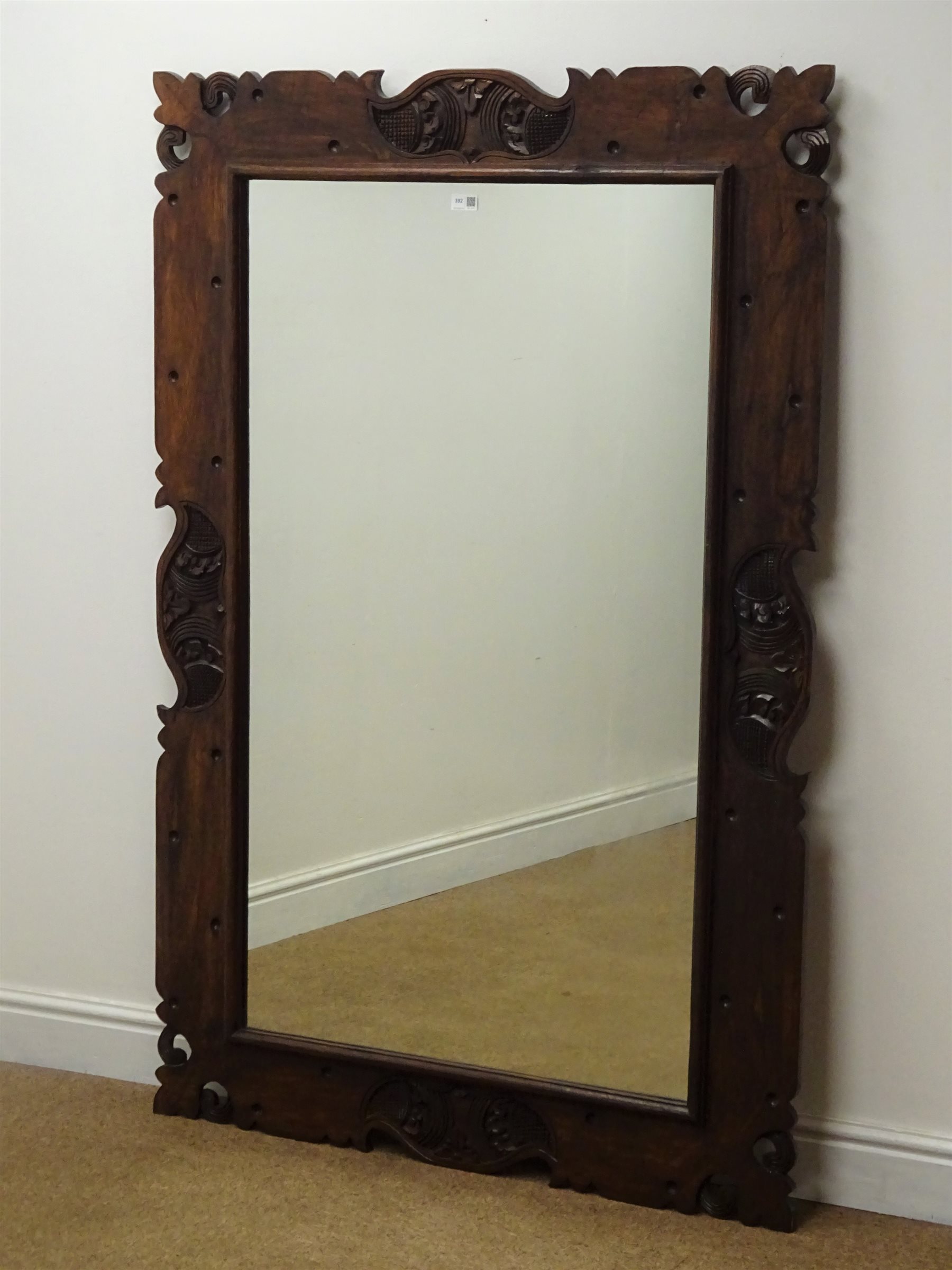 Large Southern African hardwood carved mirror, W101cm, H150cm