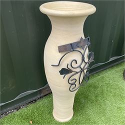 Graduating pair concrete effect square planters (largest - 34cm x 34cm, H71cm), and a tall garden urn planter with scrolled metalwork mount (H93cm) - THIS LOT IS TO BE COLLECTED BY APPOINTMENT FROM DUGGLEBY STORAGE, GREAT HILL, EASTFIELD, SCARBOROUGH, YO11 3TX