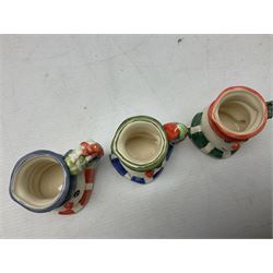 Three Royal Doulton The Mickey Mouse Collection figurines comprising Mickey Mouse MM1, Minnie Mouse MM2, and Goofy MM5, together withe three Royal Doulton limited edition miniature snowman character jugs comprising Christmas Stocking Snowman D7124, Christmas Cracker Snowman D7158 and Snowman D7062, all with original boxes 