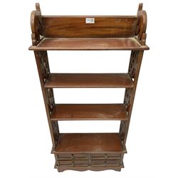 Small 20th century Chinese hardwood open bookcase, fitted with three open shelves flanked by pierced uprights, with four drawers to base