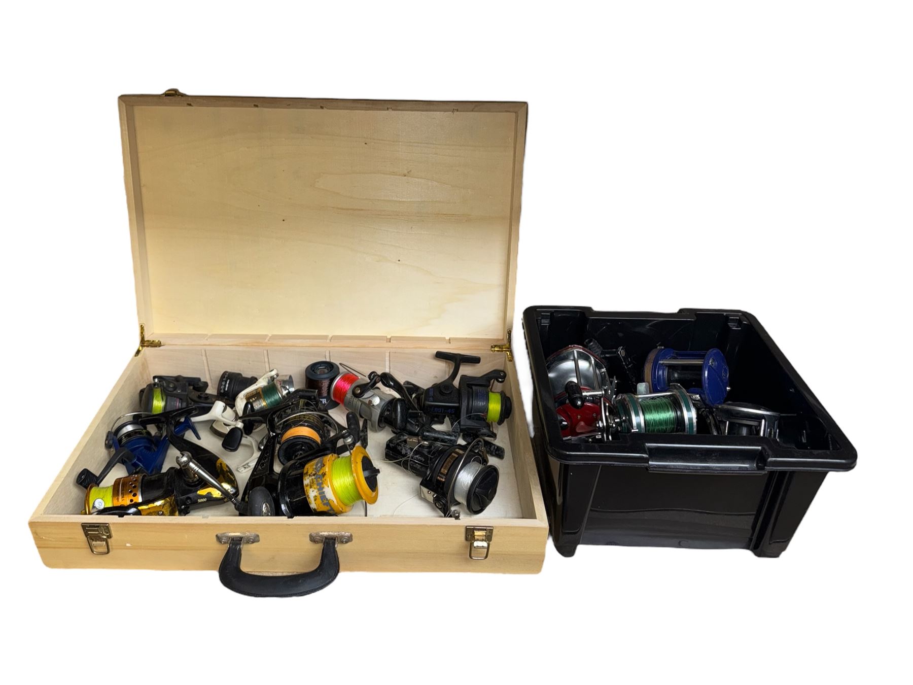 Collection of mostly sea fishing reels, including Mitchell Riptide, Shakespeare Sea Wolf, Daiwa Sealine, Abu Garcia Ambassadeur XLT 1 Synchro , in two boxes