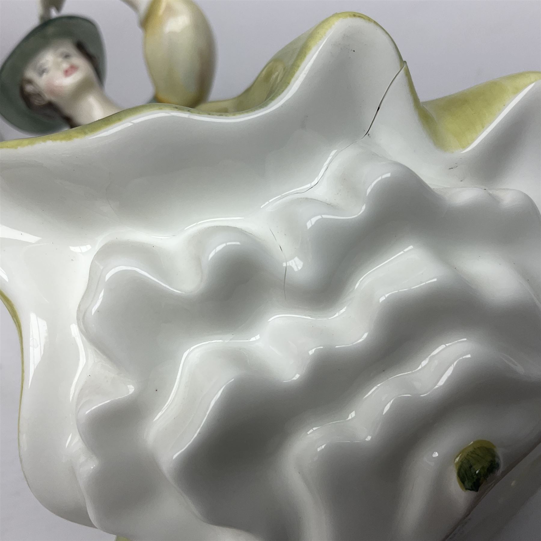 Two Royal Doulton figures, Buttercup HN2309 and Ascot HN2356, together with Capodimonte figure Hussar and His Lady 