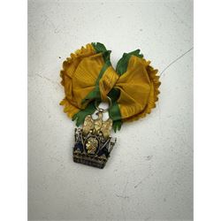 Kingdom of Italy Order of the Iron Crown, replica, the Knight’s breast badge in gilt metal and enamel with crowned bust of Emperor Napoleon facing left to the centre, in fitted case; Auctioneer's Note: The order was created by Napoleon I on June 5, 1805, as the highest order of the Italian kingdom, abolished in 1814.After the transition of most of the Italian kingdom under the rule of the Austrian Empire, the order was restored by the emperor Austrian in 1816.