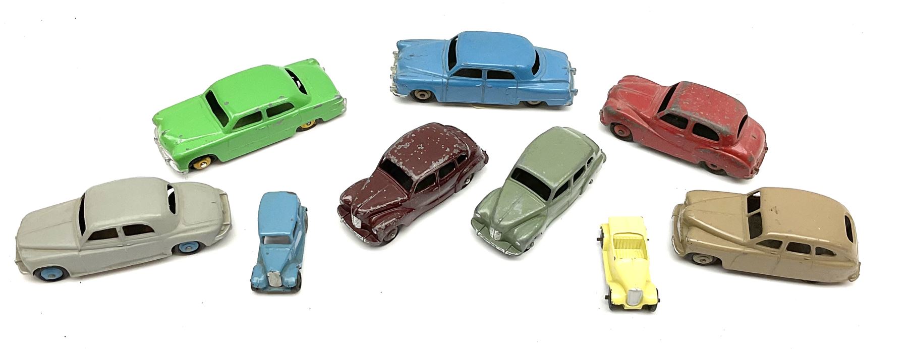 Dinky - seven unboxed and playworn die-cast cars comprising Studebaker, Ford Sedan, Rover 75, Vanguard, Austin Somerset and two Austin Devons; together with two Dublo size scale cars (9)