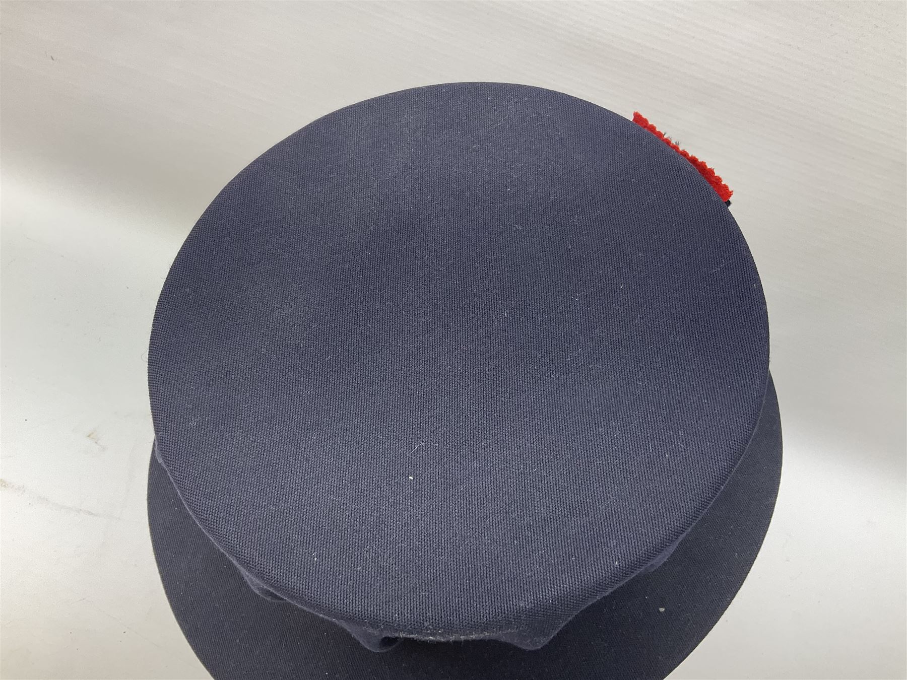 Elizabeth II Yeoman Warders (Beefeater) No.1 Undress blue uniform - comprising tunic bearing label Crown Military Uniforms H.M. Tower of London and bonnet by S. Patey (2) 