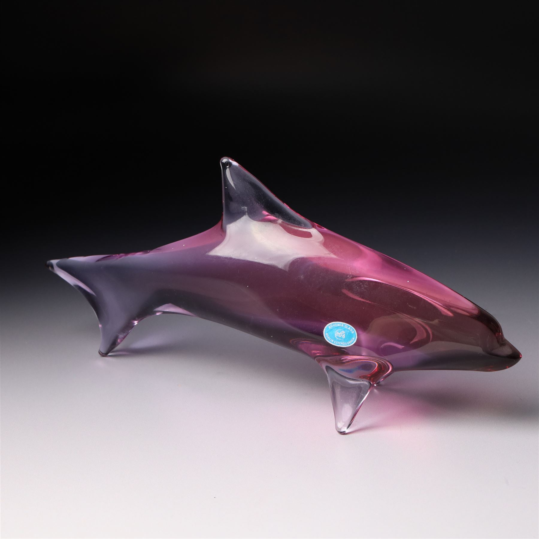 Mats Jonasson Signature Collection glass dolphin, two Caithness glass vases with dolphin decoration, Bohemia glass dolphin, Swarovski dolphin and other dolphin items