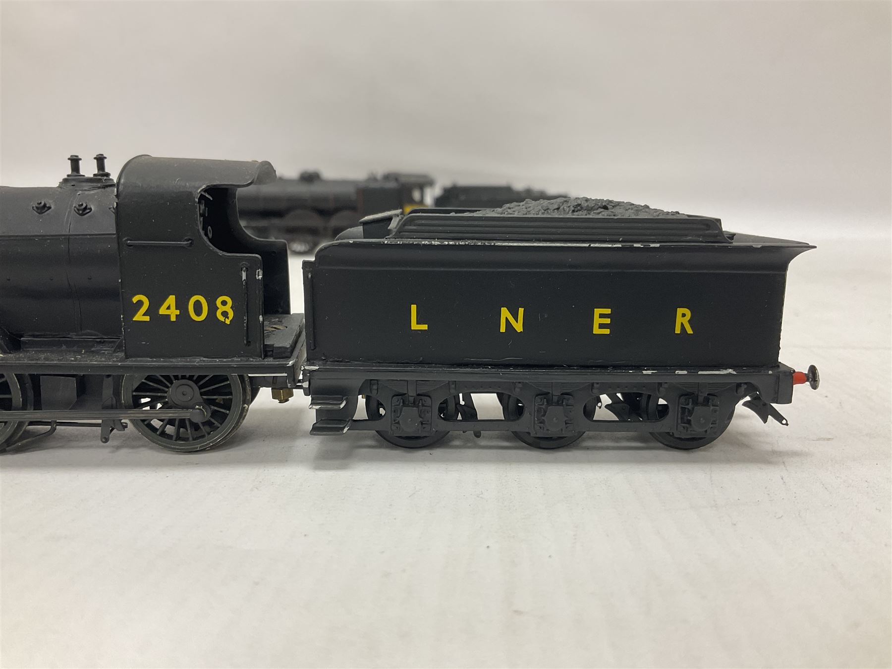 ‘00’ gauge - three kit built locomotive and tenders comprising Class D21 4-4-0 no.1242 finished in NER black with LNER tender; Class C4 4-4-2 no.5262 finished in LNER black; Coal Engines Class 0-6-0 no.2408 finished in black with Millholme Models LNER tender (3) 