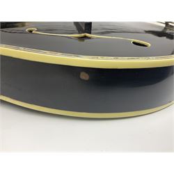 Eastern F-hole eight-string mandolin with black finish and mother-of-pearl inlay of a man riding a winged horse/unicorn amongst clouds and stars with playing card suits to the fingerboard L71cm