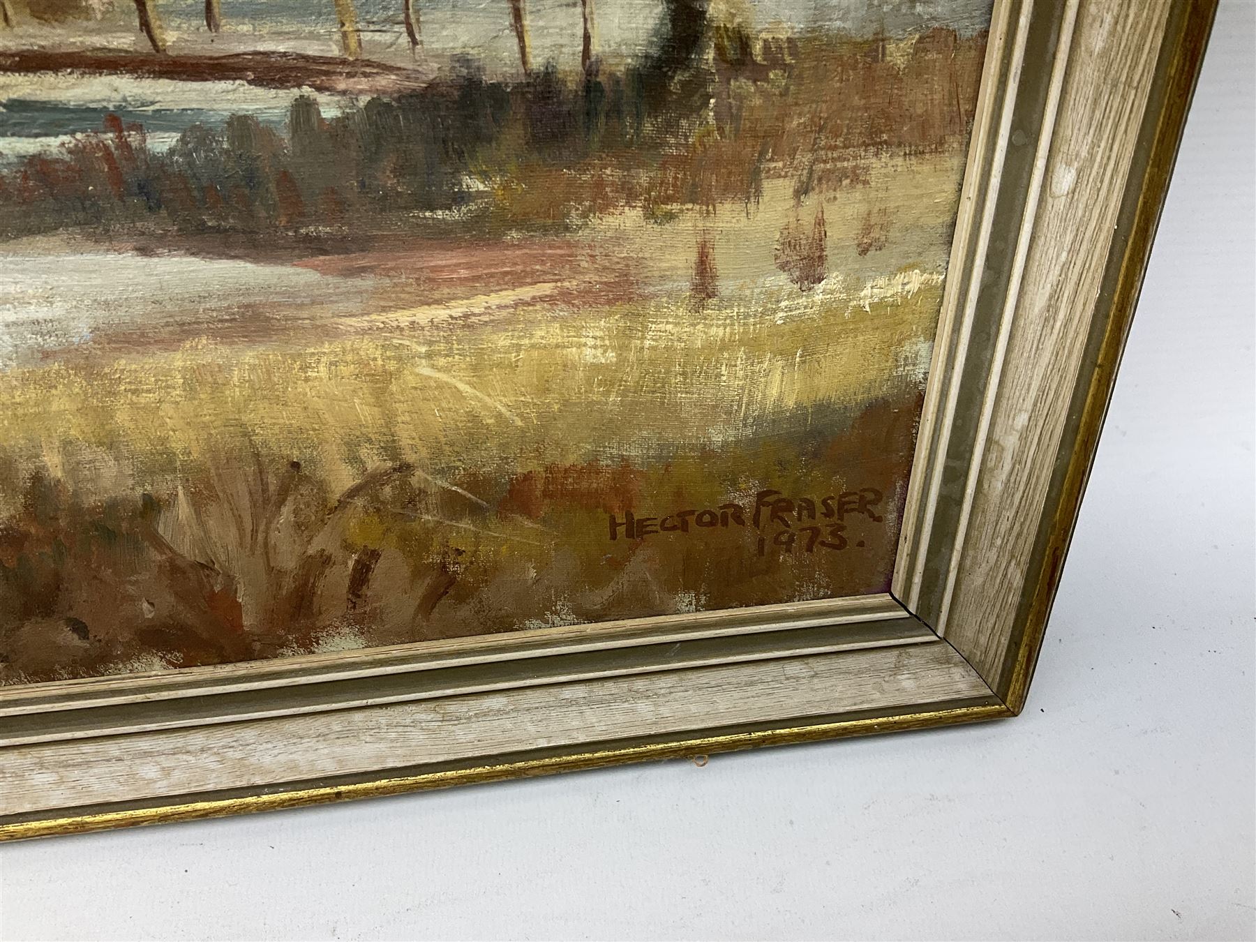 Hector Fraser (British 20th century): 'River Meadow', oil on board signed and dated 1973 together with two similar oils by different hands max 40cm x 60cm (3)