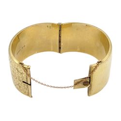 9ct gold wide hinged bangle, with bright cut foliate decoration, by Smith & Pepper Ltd, Birmingham 1963, boxed