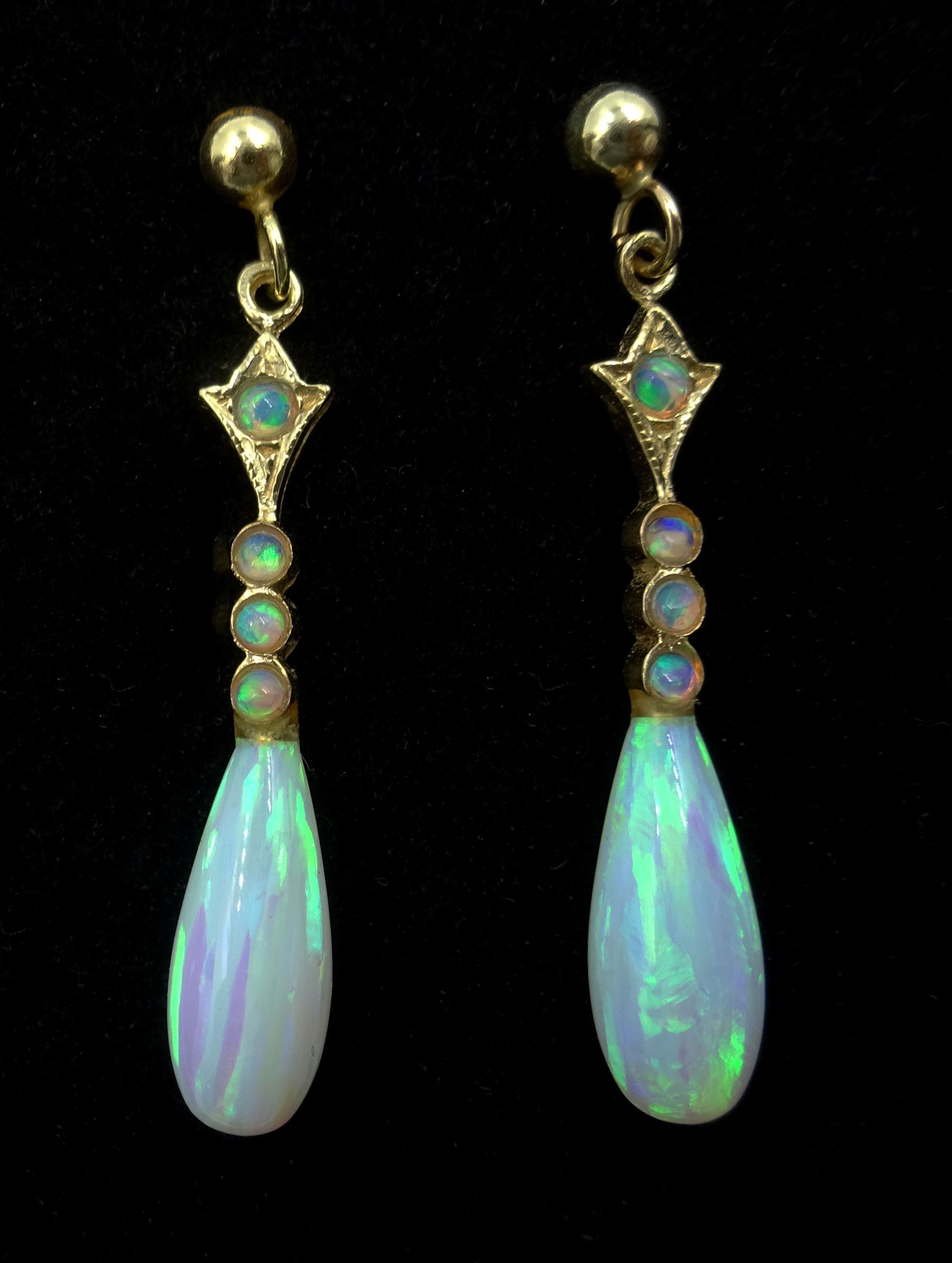Pair of 9ct gold opal pendant stud earrings, stamped 375