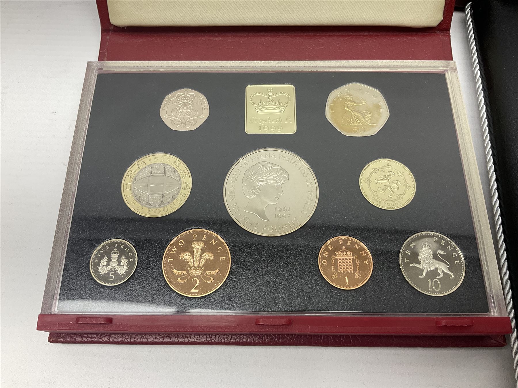 Single owner lifetime collection of mostly commemorative modern World coins with gold, silver and base metal examples, including two Queen Elizabeth II Bailiwick of Guernsey twenty-five pound gold coins 'The 1999 Royal Wedding' and '100th Anniversary of the End of the Victorian Era' 2001 each in 24 carat gold weighing 7.81 grams with certificates, silver coins commemorating the Millennium 2000 including Guyana sterling silver proof two-thousand dollars, Fiji sterling silver proof five dollars etc, silver coins from the Queen Elizabeth II Golden Jubilee Collection dated either 2002 or 2003 from Great Britain and the Commonwealth countries, United Kingdom commemorative crowns in card folders, The Royal Mint United Kingdom 1997 proof coin set in red folder without certificate etc