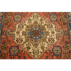  Persian red ground rug, blue border, 132cm x 185cm  