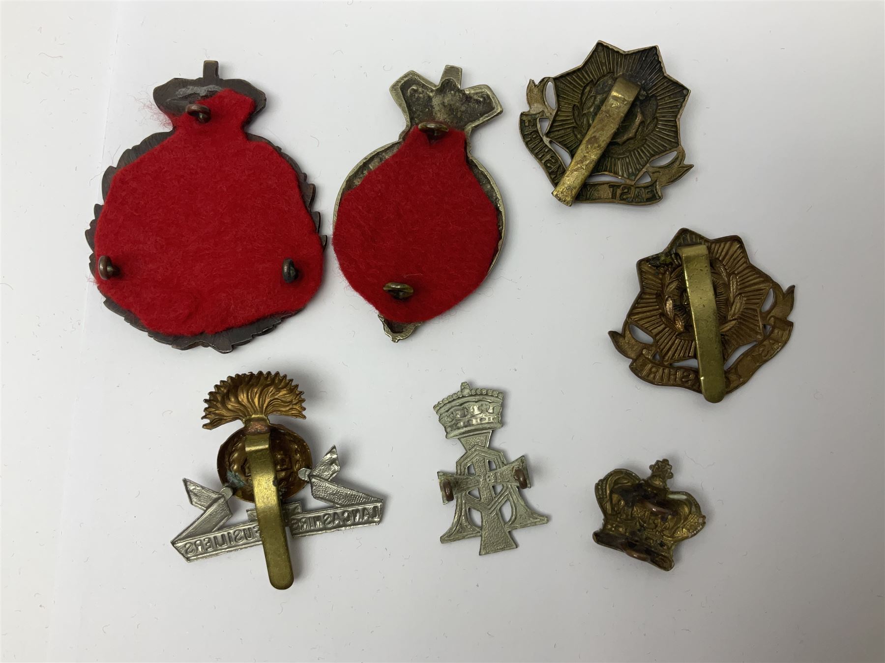 Over thirty regimental cap badges for fusiliers, Yorkshire interest, Light Infantry etc including Royal Scots and Welsh fusiliers, Durham L.I., KO Yorkshire L.I., Oxford & Bucks L.I., Green Howards, East Yorkshire, West Riding, York North Riding etc 