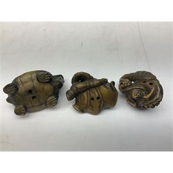 Group of fourteen Netsuke, to include two examples modelled as tortoise with a frog upon its shell, rhino, tiger, bird etc, some with marks beneath