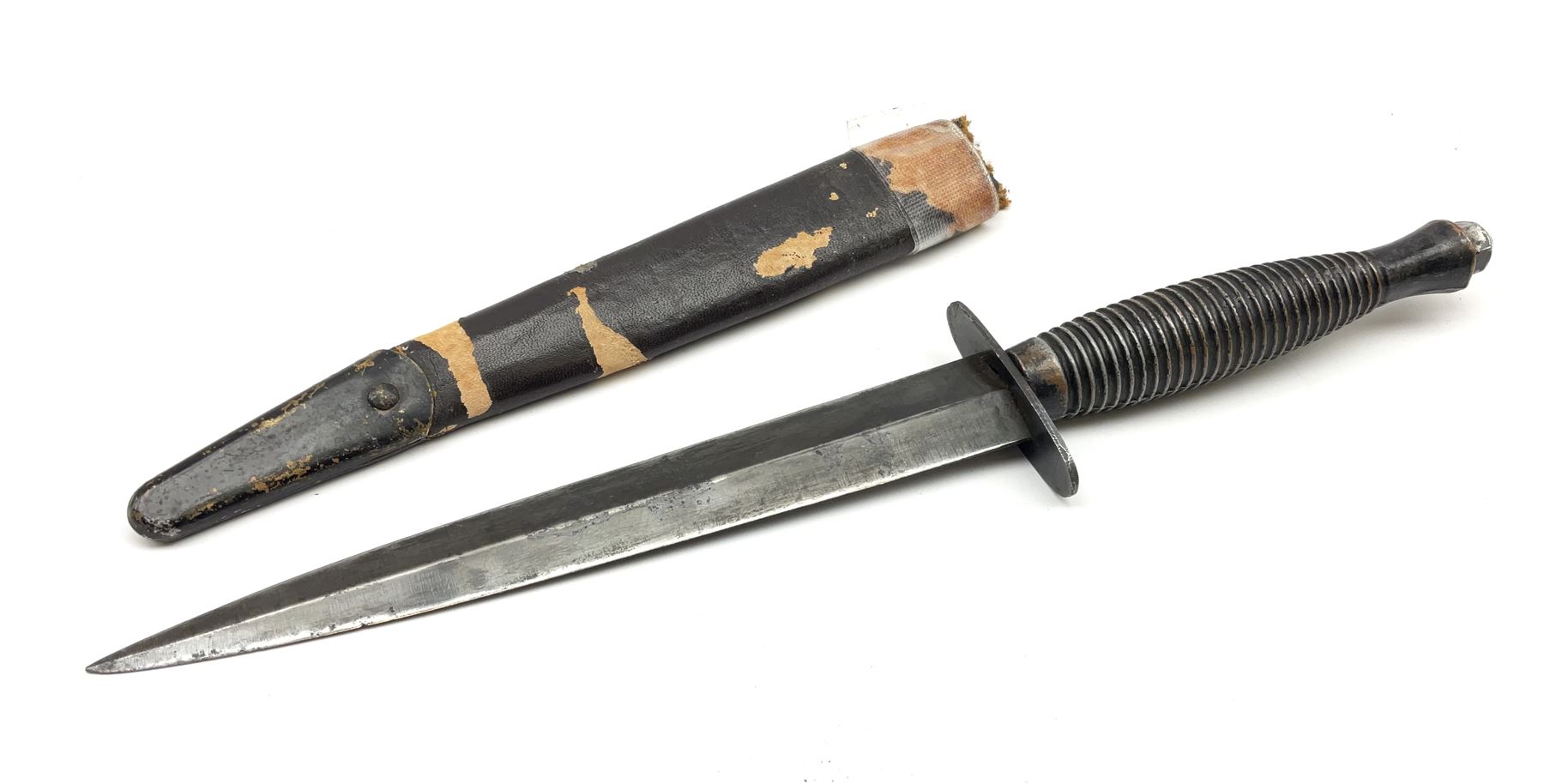 Post WW2 Fairbairn Sykes style black commando knife, no makers name but the handle marked with 'crossed keys *A' L30cm, in part scabbard