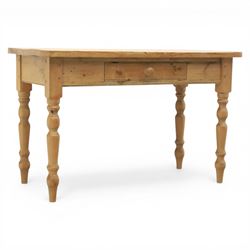 Victorian design stripped pine table, rectangular top with rounded corners, single centre drawer, raised on four turned legs