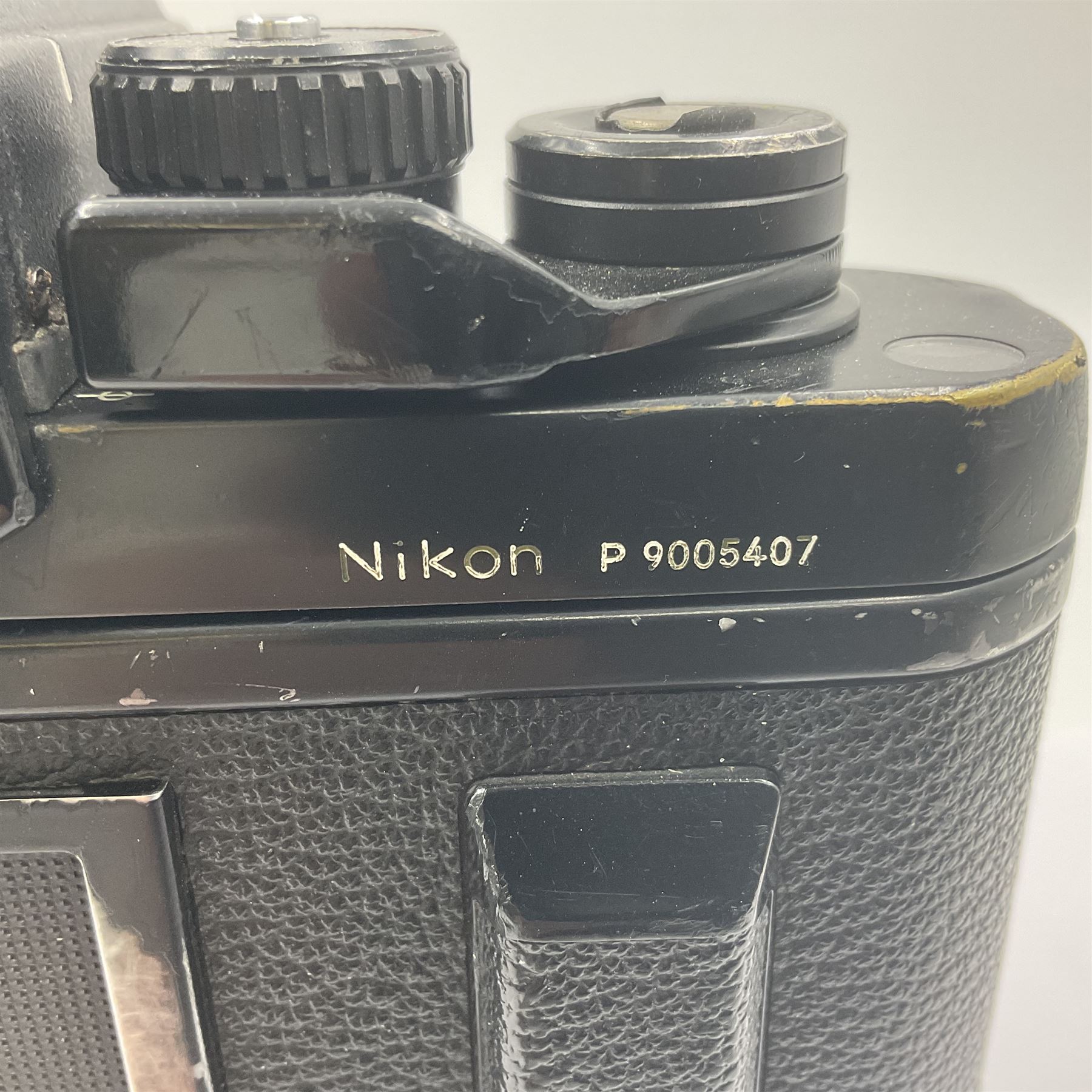 Nikon F3P camera body, serial no. P9005407, with 'Nikon Series E 50mm 1:1.8' lens, serial no. 3091948, Nikon Motor Dive, serial no.342660 and Nikon MK1 Firing Rate Converter 