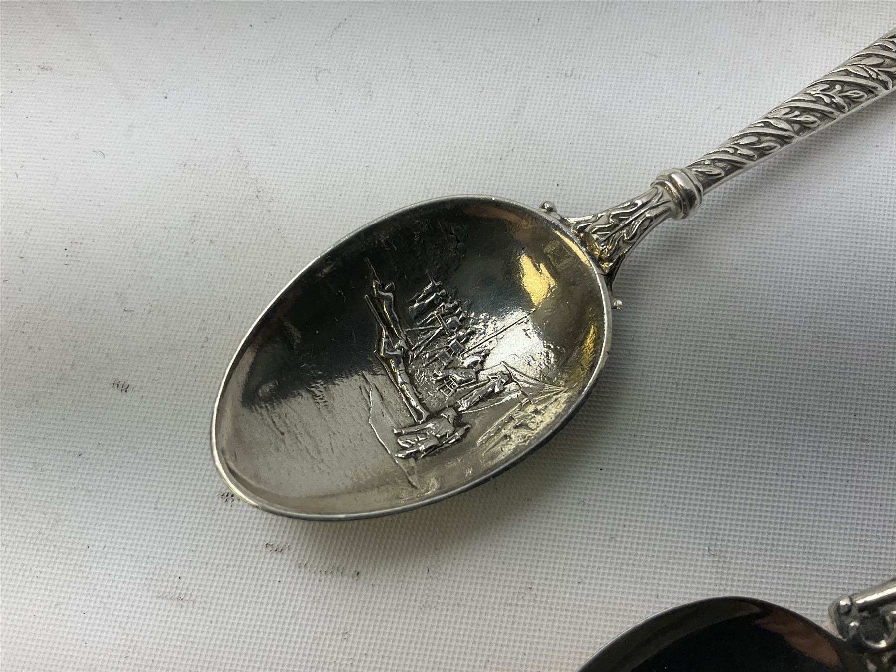 Three hallmarked silver shooting spoons including Royal Military College Rifle Club, Eastern Command S. of M. Hythe etc (3)