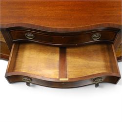 Georgian design mahogany serpentine sideboard, shaped top over two central drawers flanked by cupboard doors, flame mahogany veneered fronts with satinwood stringing, oval brass handles, shaped apron, on square tapering supports with spade feet