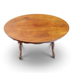 Victorian mahogany breakfast table, oval moulded top over a shaped frieze, on twin pierced lyre-form end supports with moulded scroll feet, united by a turned stretcher, on castors