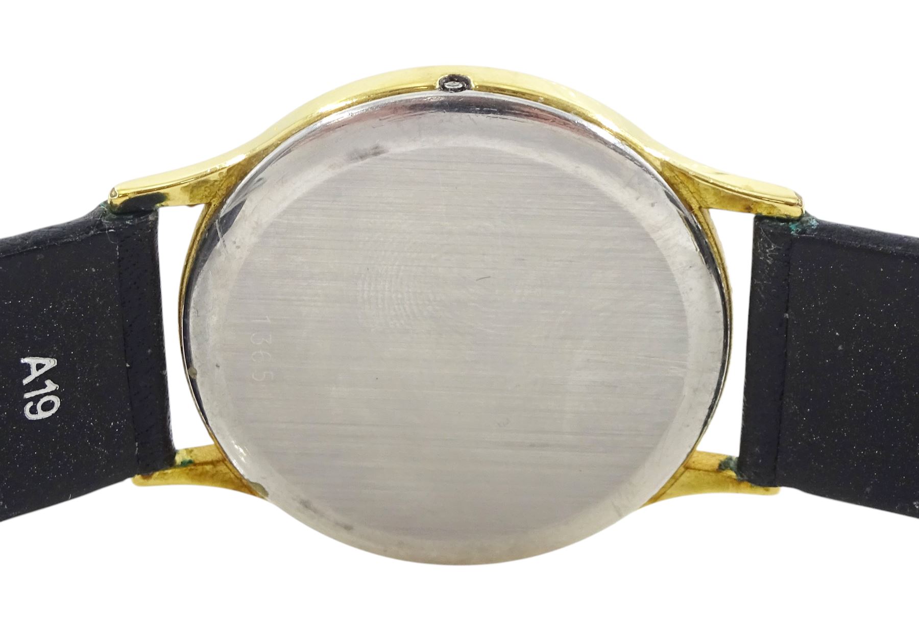 Omega De Ville gentleman's gold-plated and stainless steel quartz wristwatch, Ref. 1365, champagne dial with baton hour markers, on black leather strap, with Omega buckle
