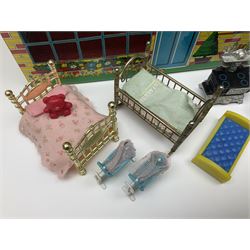 Mid-century Marx style tin dollhouse and quantity of dolls house furniture, H35cm