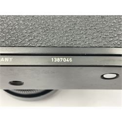 Leitz Leicaflex SL2 camera body, serial no.1387046, with 'Summicron-R 1:2/50 Leitz Wetzlar' lens, serial no. 2273397, within a leather Leitz lens hood 