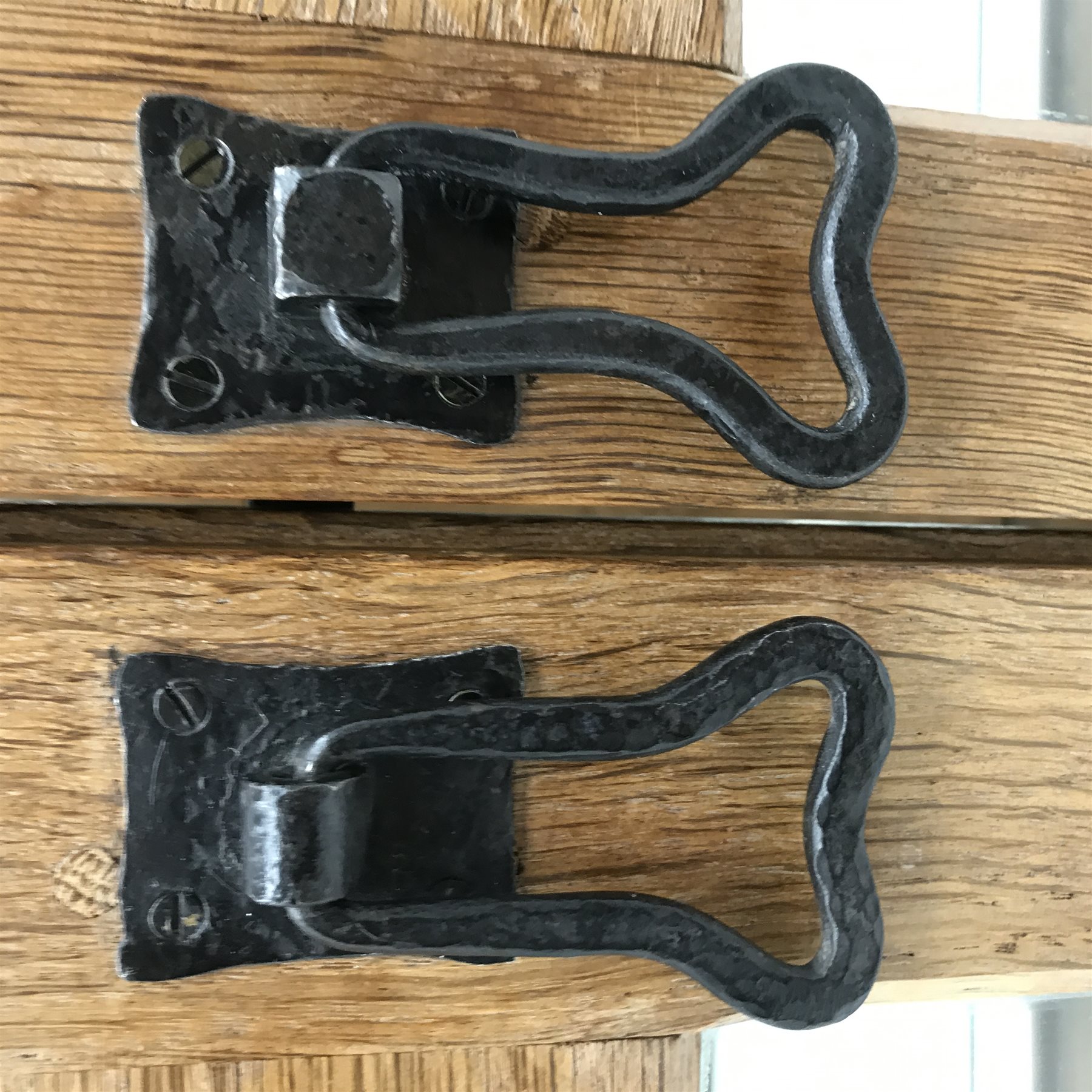 'Foxman' large oak and glazed display cabinet, two doors enclosing three glass shelves and mirrored back, by Don Craven of Oldstead, Thirsk, W154cm, H169cm, D47cm
