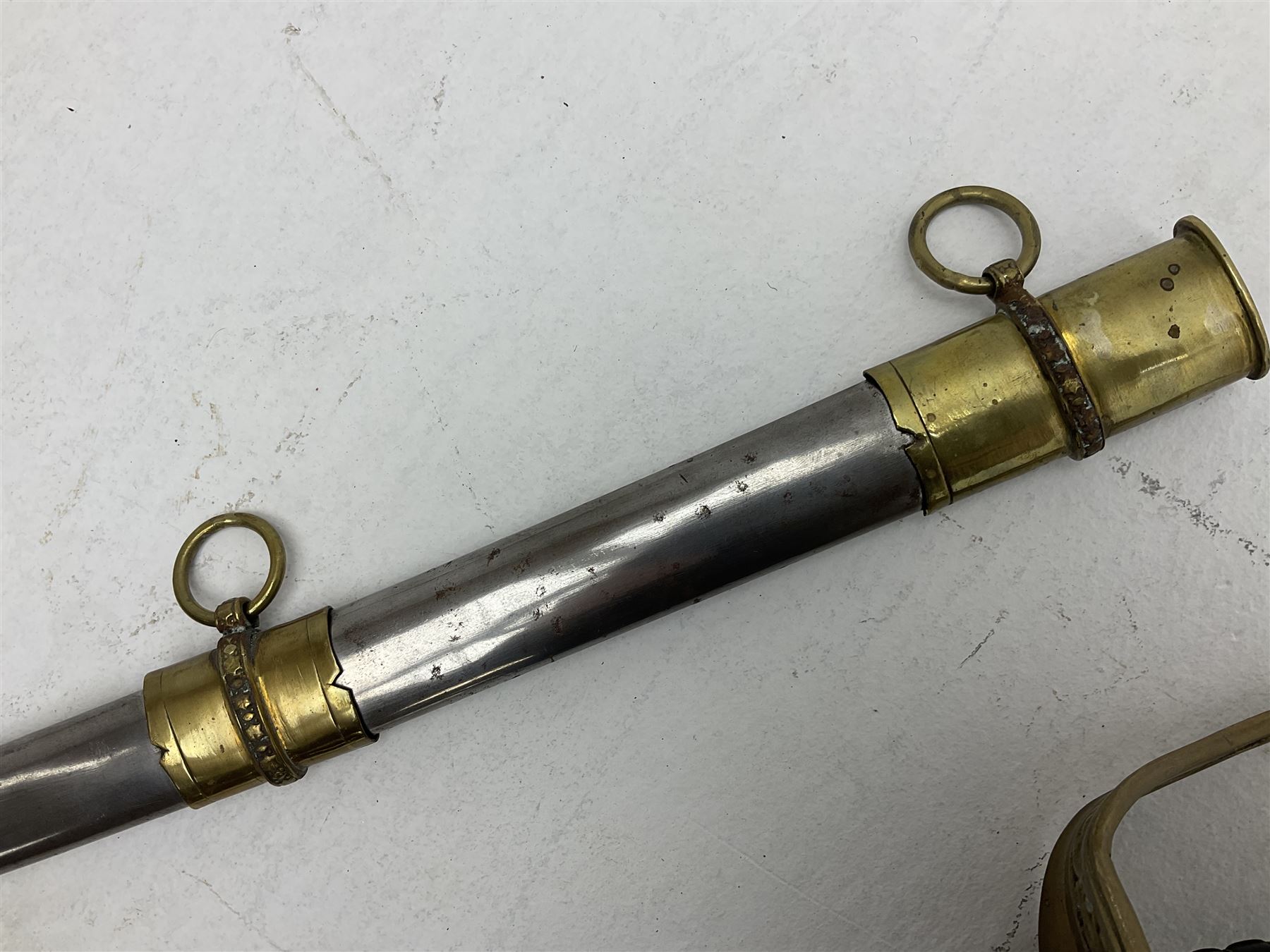 Reproduction American Civil War Cavalry trooper's sword, the 88cm slightly curving fullered steel blade marked to the ricasso 'Ames & Co Chicopee Mass.' and 'US ADK 1862'; brass hilt and leather covered grip; in steel scabbard L110cm overall;  and another reproduction sword (2)