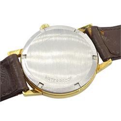 Omega Geneve gentleman's gold-plated manual wind wristwatch, on original brown leather strap