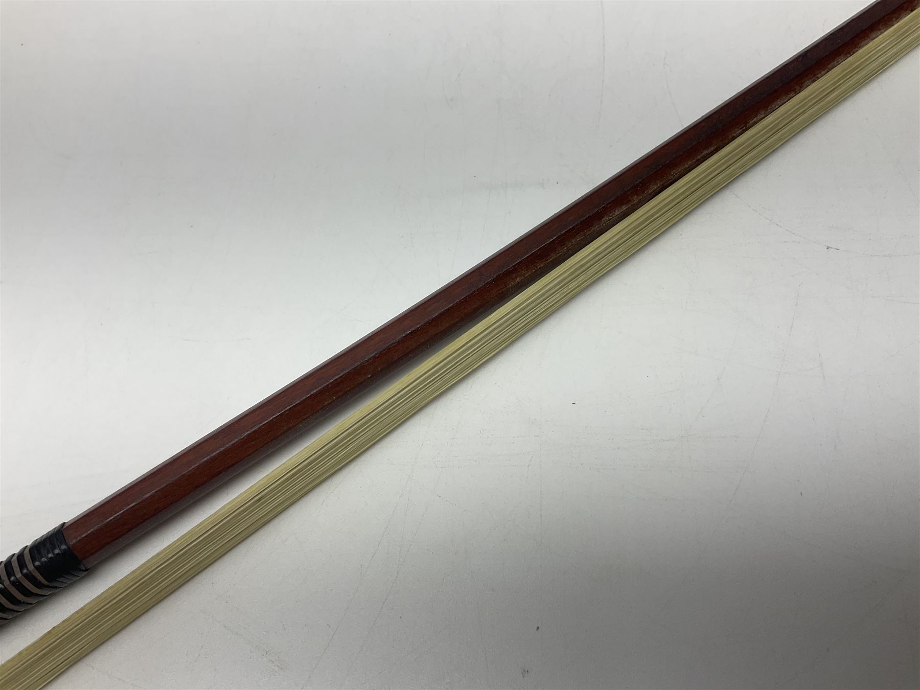 Nickel mounted pernambuco violin bow stamped R. Paesold L73.5cm