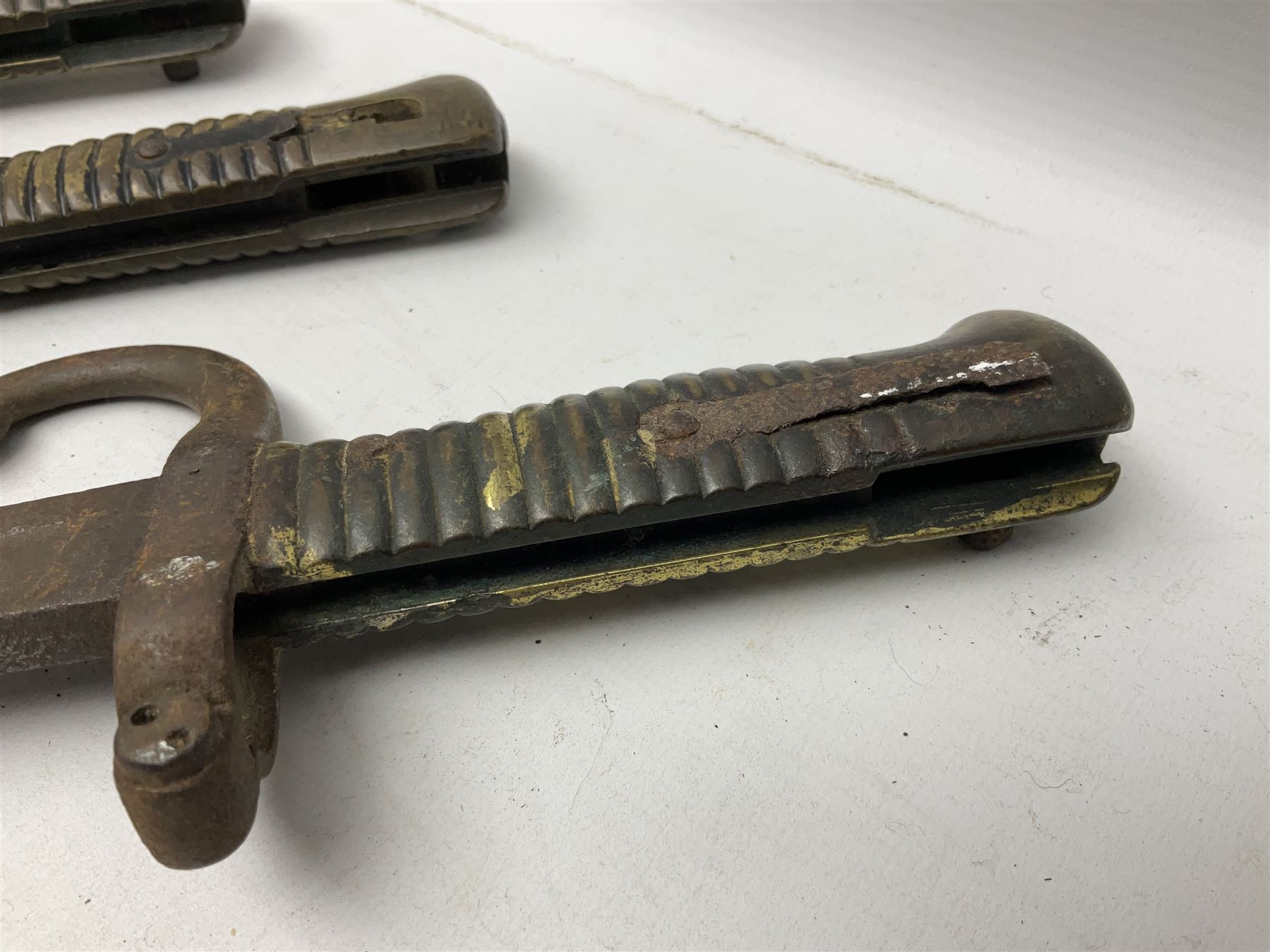 Five 19th century bayonets in relic condition without scabbards comprising British Pattern 1876 socket bayonet with Indian markings; French Model 1874 epee bayonet; and three French Model 1866 sabre bayonets (5)