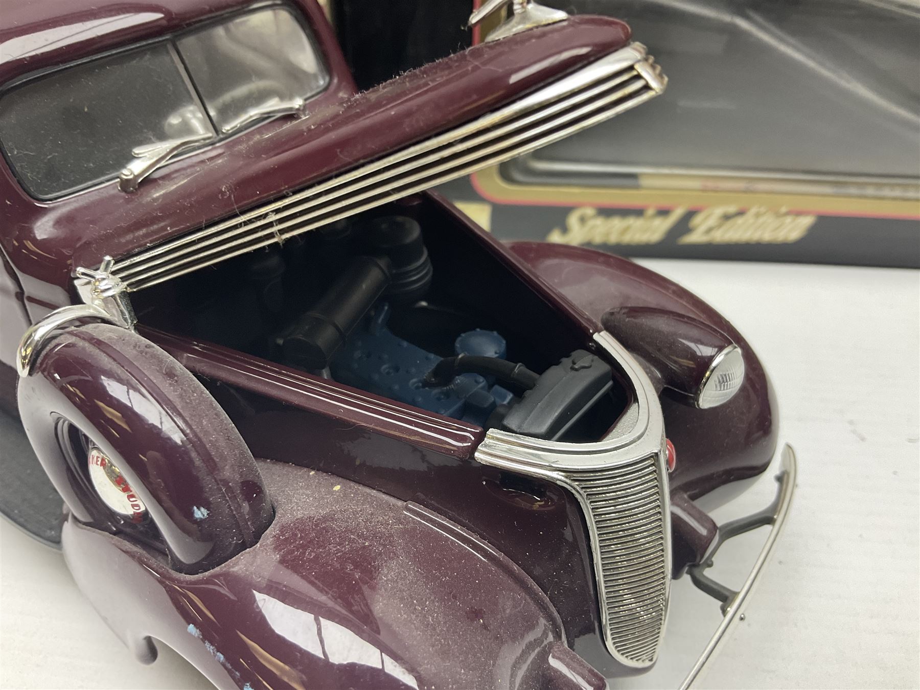 Seven 1:18 scale die-cast models by Ertl, Road legends, Maisto, Solido etc including two Coca Cola promotional vehicles; five boxed (7)