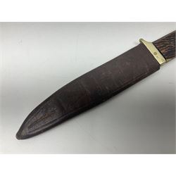 WW2 fighting knife, the 13cm blade by Priestman of Sheffield marked with scout and camp fire motif; two piece antler grip; in leather sheath crudely marked R.T. with a broad arrow L23cm overall Auctioneers Note: By family descent this knife was reputedly presented to Richard Towse during WW2 for guarding a group of POWs.