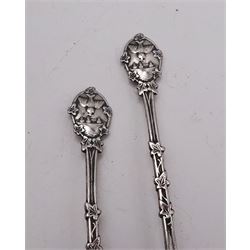 Gorup of silver, comprising pair of Edwardian silver napkin rings, with repousse floral decoration, hallmarked E J Trevitt & Sons, Chester 1903, together with set of three 1930s silver Hanoverian pattern coffee spoons, each with rattail bowls and engraved initial to terminals, hallmarked Frank Cobb & Co Ltd, Sheffield 1936, a pair of early 20th century coffee spoons, each embossed with nesting birds to terminals, with ivy leaf borders and stems, hallmarked Robert James Chaplin & Sons, London 1919, and a Siamese silver mounted cigarette box, with niello work dragon boat scene to cover, lifting to reveal wood lined interior, stamped Sterling Siam, H3.2cm W9.7cm